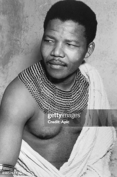 South African anti-apartheid revolutionary Nelson Mandela wearing traditional beads and a bed spread during his time in hiding from the police, South...