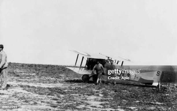 French plane, piloted by american Chapman, of Lafayette squadron with swastika and indian head, painted on it, 1916