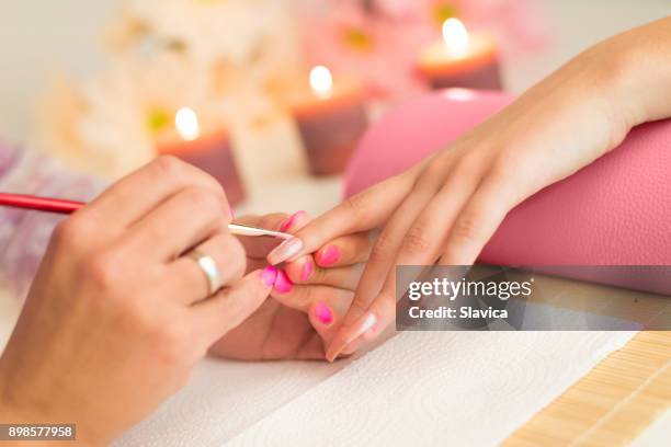 manicure process in beauty salon - how to paint my nails stock pictures, royalty-free photos & images