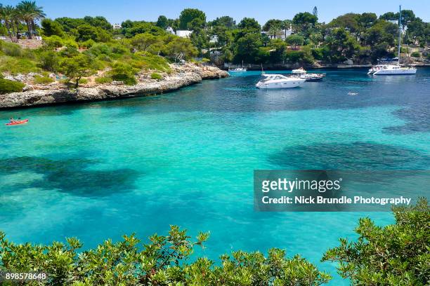 cala d'or, mallorca, spain - beach at cala d'or stock pictures, royalty-free photos & images