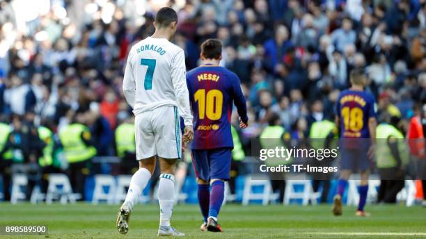 Cristiano Ronaldo of Real Madrid and Lionel Messi of Barcelona looks on during the La Liga match between Real Madrid and Barcelona at Estadio...