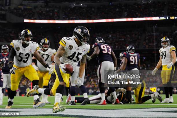 Roosevelt Nix of the Pittsburgh Steelers rushes for a touchdown in the second quarter against the Houston Texans at NRG Stadium on December 25, 2017...