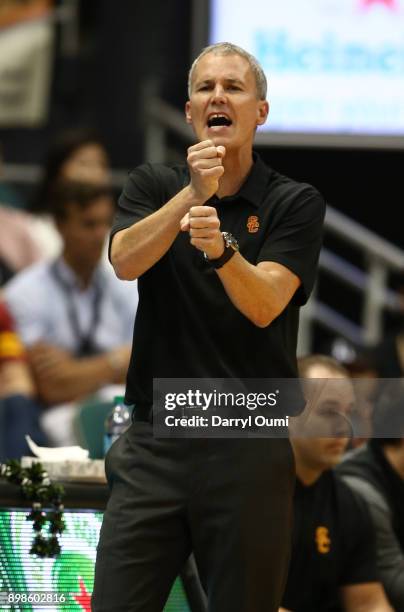 Head coach Andy Enfield of the USC Trojans calls in a play during the first half of the championship game of the Diamond Head Classic against the New...