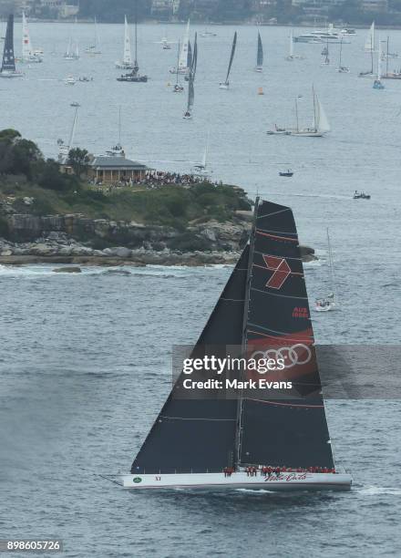 Super Maxi Wild Oats XI passes South Head in Sydney Harbour before the start of the 2017 Sydney to Hobart Yacht Race on December 26, 2017 in Sydney,...