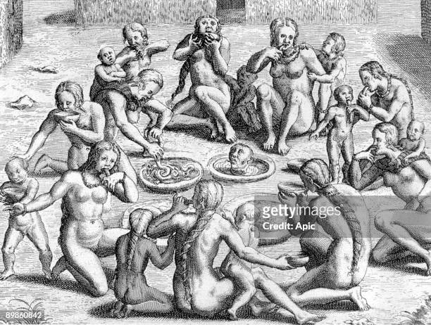 Broth is Made From the Intestines : cannibalism by Indians in New World , engraving by Theodore de Bry for book "Le Voyage au Brezil de Jean de Lery...