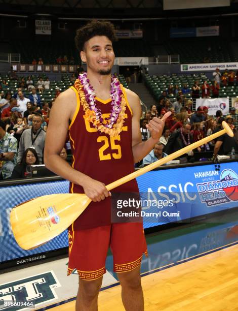 Bennie Boatwright of the USC Trojans poses for a photo and trophy after being named the Most Valuable Player of the Diamond Head Classic at the Stan...