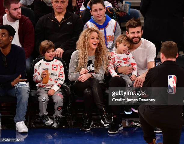 Milan Pique Mebarak, Shakira, Sasha Pique Mebarak and Gerard Pique attend the New York Knicks Vs Philadelphia 76ers game at Madison Square Garden on...