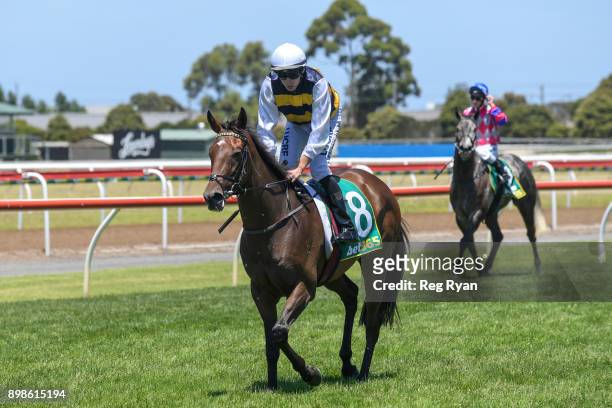 Declan Bates returns to the mounting yard on Star D'vega after winning the IGA Liquor Maiden Plate, at Geelong Racecourse on December 26, 2017 in...
