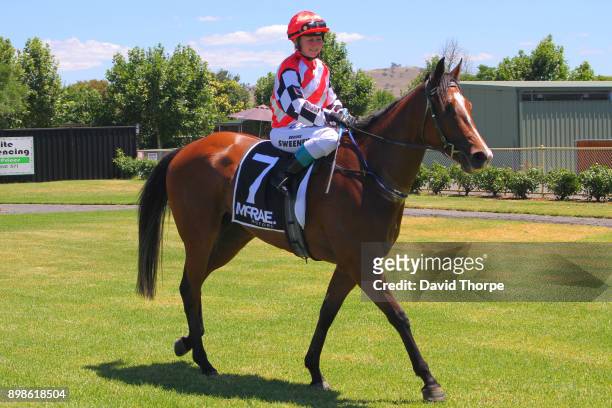 Squillosa ridden by Brooke Sweeney returns to the mounting yard after winning the McRae Motors F&M Maiden Plate on December 26, 2017 in Wodonga,...