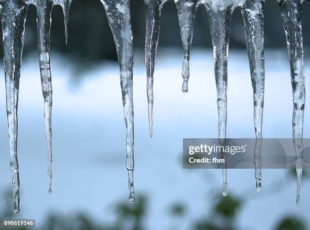 icicles - eiszapfen stock-fotos und bilder