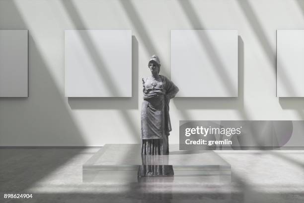 museum exhibition with athena sculpture - athena greek goddess stock pictures, royalty-free photos & images