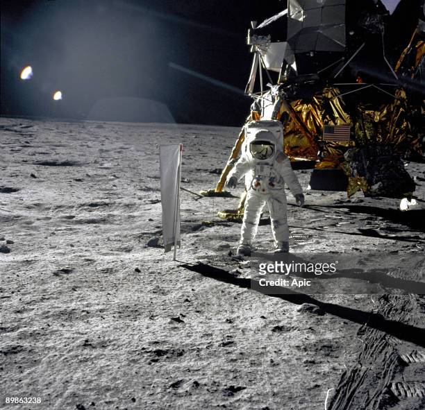 Astronaut Buzz Aldrin, lunar module pilot, walks on the surface of the Moon near the leg of the Lunar Module "Eagle" during the Apollo 11...