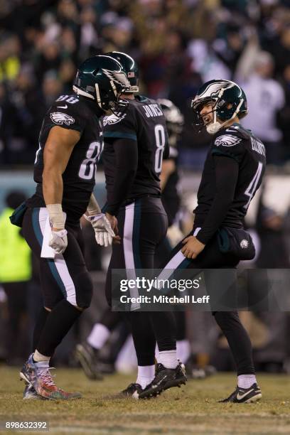 Jake Elliott of the Philadelphia Eagles celebrates with Trey Burton after kicking the game winning field goal in the final moments of the game...