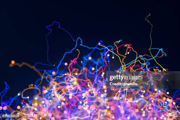 partículas de zarcillo resumen - tendril fotografías e imágenes de stock