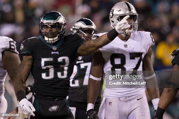 Nigel Bradham of the Philadelphia Eagles reacts in front of Jared Cook of the Oakland Raiders after the Philadelphia Eagles recovered a fumble in the...