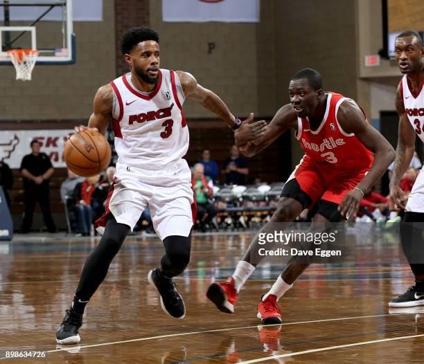 Larry Drew II of the Sioux Falls Skyforce tries to make a move past Durand Scott of the Memphis Hustle during an NBA G-League game on December 25,...