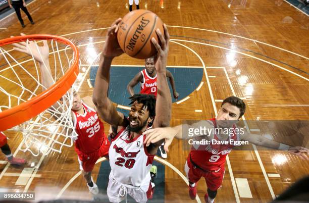 Kadeem Jack of the Sioux Falls Skyforce grabs a rebound in front of Dusty Hannahs of the Memphis Hustle during an NBA G-League game on December 25,...