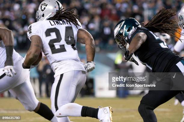 Oakland Raiders RB Marshawn Lynch outruns Eagles LB Dannell Ellerbe in the first half during the game between the Oakland Raiders and Philadelphia...