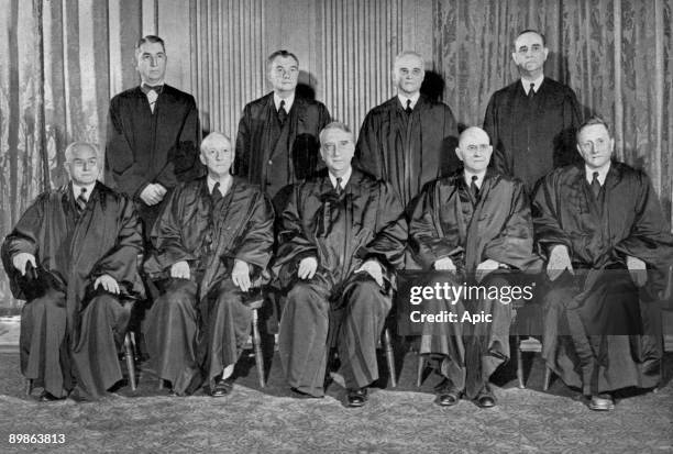 The nine judges of the supreme court from left to right at the top Tom Clark Robert Jackson Harold Burton and Sherman Minton down Felix Frankfurter...