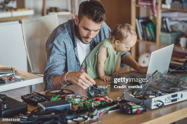 Baby Fixing Computer Child Fixing Computer Photos and Premium High Res Pictures - Getty Images
