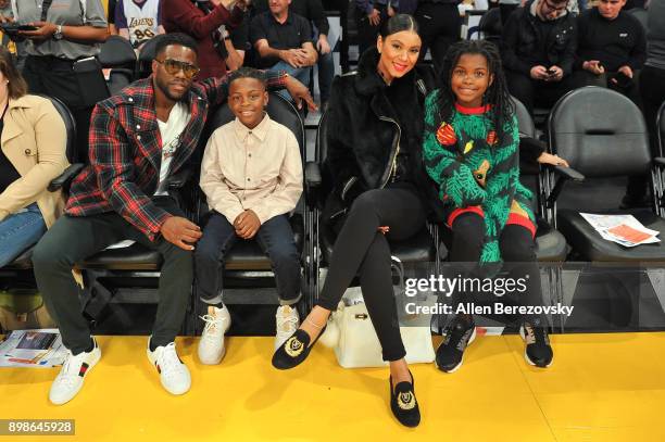 Comedian Kevin Hart, son Hendrix Hart, wife Eniko Parrish and daughter Heaven Hart attend a basketball game between the Los Angeles Lakers and the...