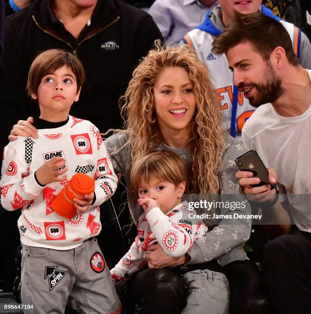 Milan Pique Mebarak, Shakira, Sasha Pique Mebarak and Gerard Pique attend the New York Knicks Vs Philadelphia 76ers game at Madison Square Garden on...