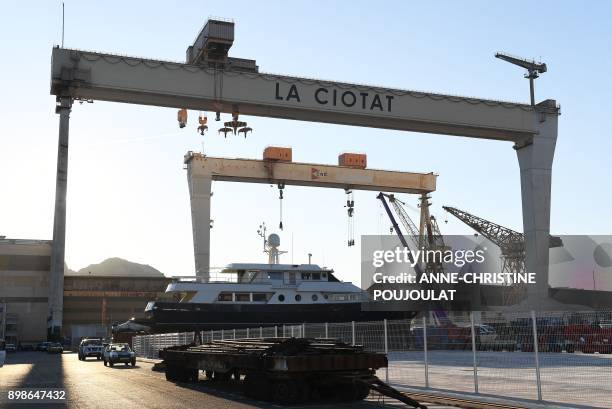 Picture taken on December 21, 2017 shows superyachts in repair at the La Ciotat shipyards, southern France. The shipyard of La Ciotat closed down in...