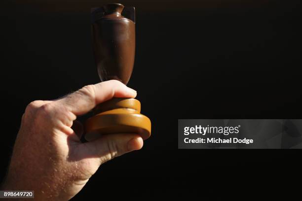 An Australian fan shows off the urn to England fans during day one of the Fourth Test Match in the 2017/18 Ashes series between Australia and England...
