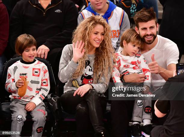 Milan Pique Mebarak, Shakira, Sasha Pique Mebarak and Gerard Pique attend the New York Knicks Vs Philadelphia 76ers game at Madison Square Garden on...