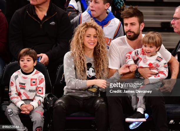 Milan Pique Mebarak, Shakira, Sasha Pique Mebarak and Gerard Pique attend the New York Knicks Vs Philadelphia 76ers game at Madison Square Garden on...