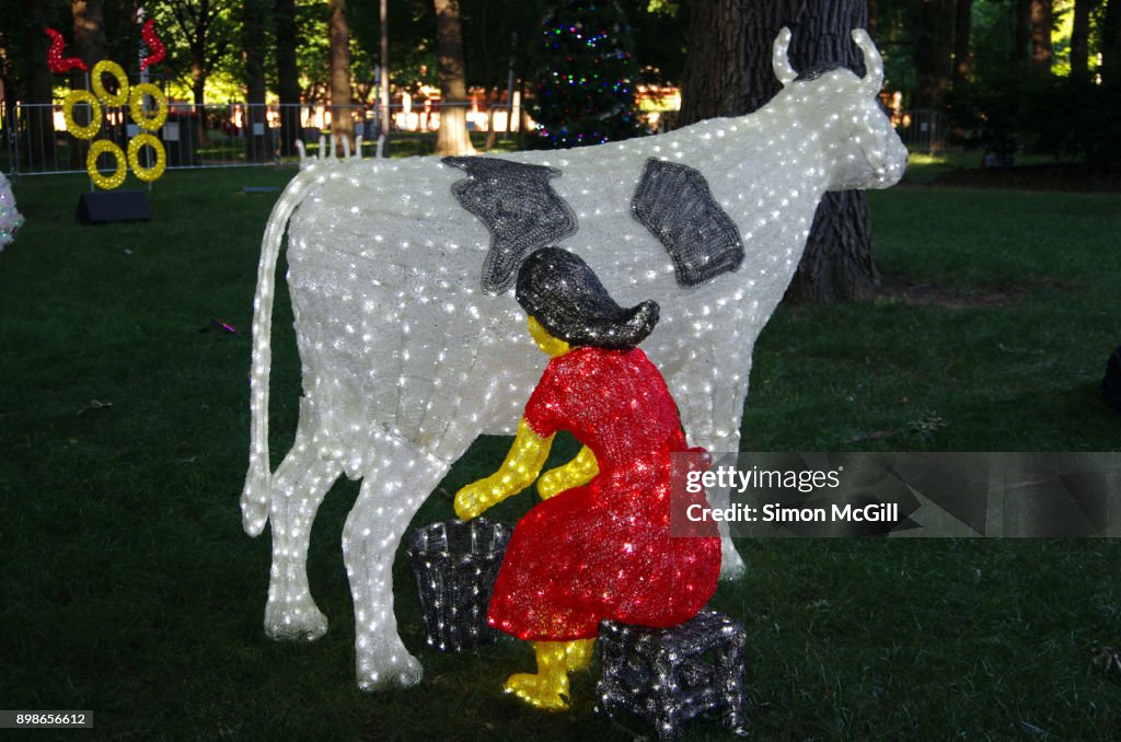 A statue of a Maid a-Milking at Christmas in Glebe Park, Glebe Park, Canberra City, Australian Capital Territory, Australia