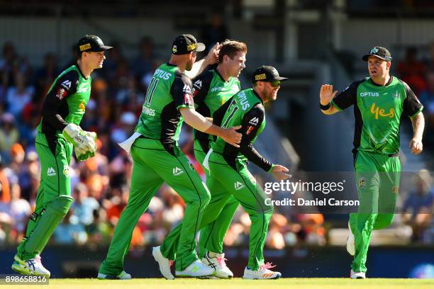 James Faulkner and Ben Dunk of the Melbourne Stars celebarte taking a wicket during the Big Bash League match between the Perth Scorchers and the...