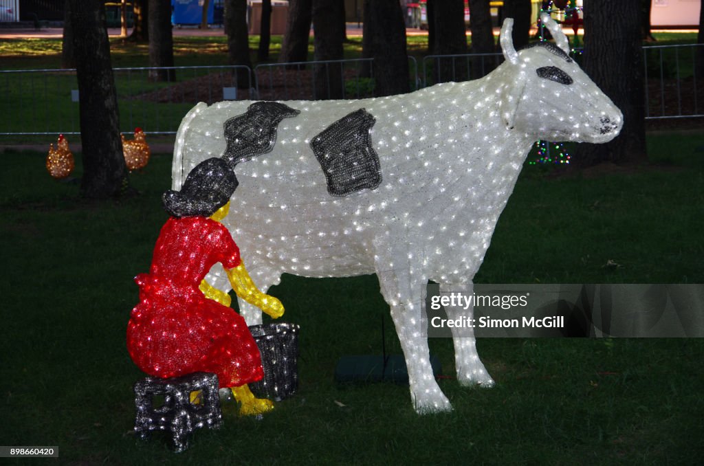 A statue of a Maid a-Milking at Christmas in Glebe Park, Glebe Park, Canberra City, Australian Capital Territory, Australia