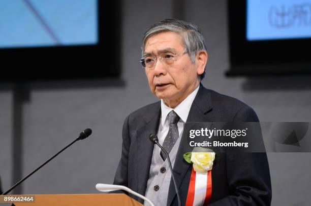 Haruhiko Kuroda, governor of the Bank of Japan , speaks during an event hosted by business lobby Keidanren in Tokyo, Japan, on Tuesday, Dec. 26,...