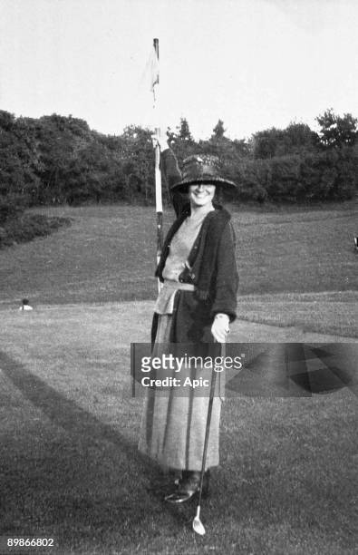 Gabrielle Chasnel called Coco Chanel , french fashion designer, here playing golf c.1910