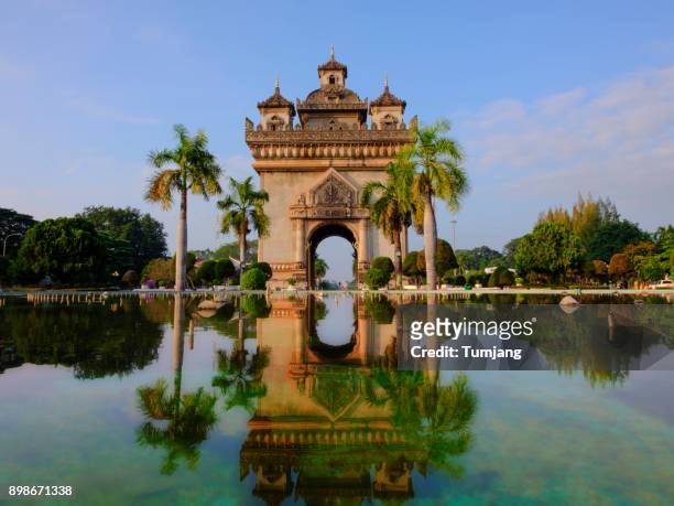 patuxay monument decorate with the light at vientiane, laos. - laos stock pictures, royalty-free photos & images