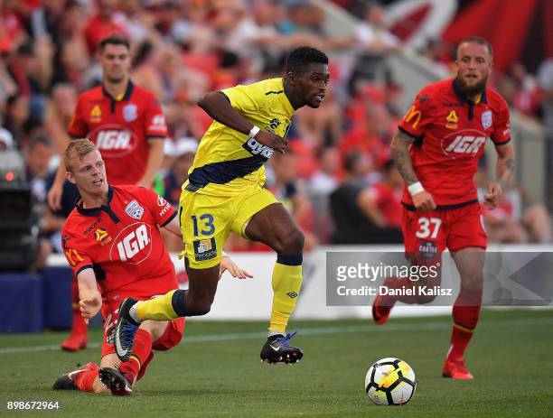 Kwabena Appiah-Kubi of the Mariners runs with the ball during the round 12 A-League match between Adelaide United and the Central Coast Mariners at...