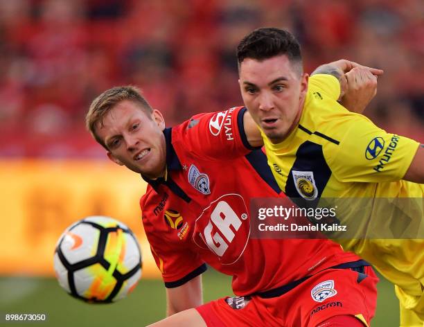 Ryan Kitto of United competes for the ball during the round 12 A-League match between Adelaide United and the Central Coast Mariners at Coopers...