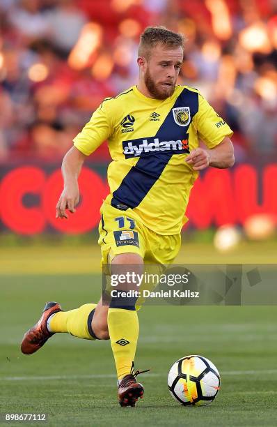 Connor Pain of the Mariners runs with the ball during the round 12 A-League match between Adelaide United and the Central Coast Mariners at Coopers...