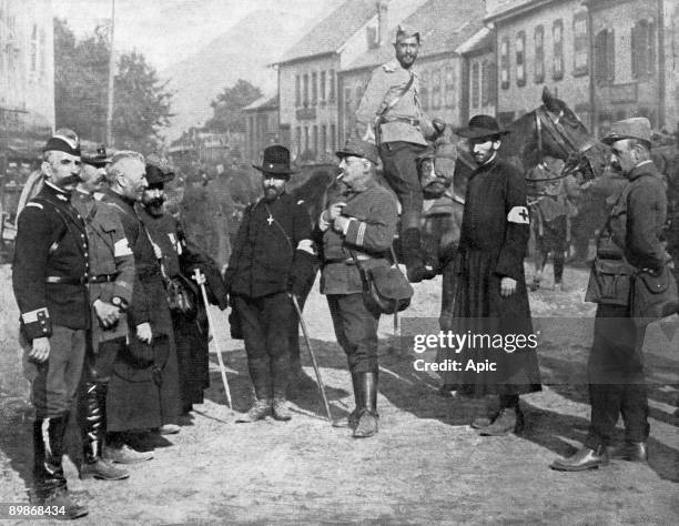 Group of army chaplains in 1914 in France : l-r : 2 catholic priests, a minister and a rabbi