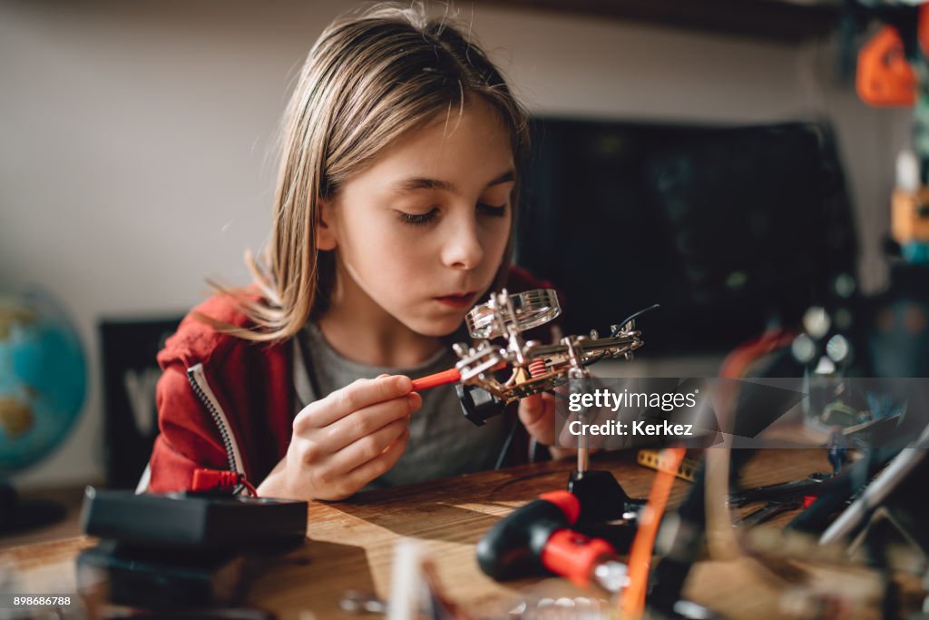 Girl learning robotics