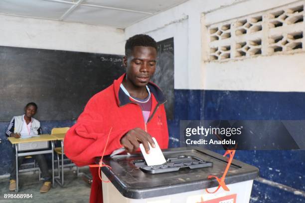 Man casts his vote at a polling station for Liberian Presidential election at Montserrado in Monrovia, Liberia on December 26, 2017.