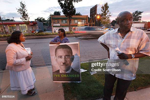 Phillip Fisher of the LaRouche Political Action Committee demonstrates outside the Sheldon Heights Church of Christ where U.S. Rep. Jesse Jackson Jr....