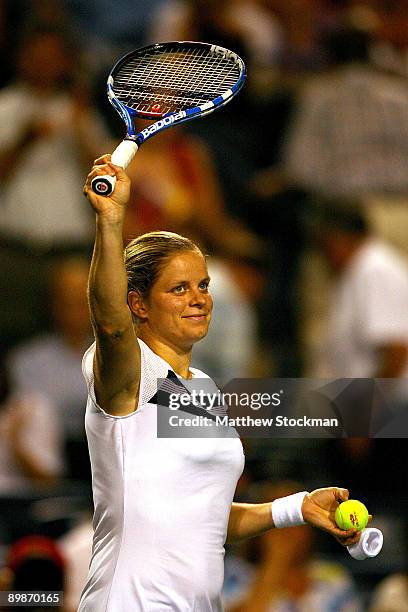 Kim Clijsters of Belgium acknowledges the crowd after defeating Elena Baltacha of Great Britain during the Rogers Cup at the Rexall Center on August...