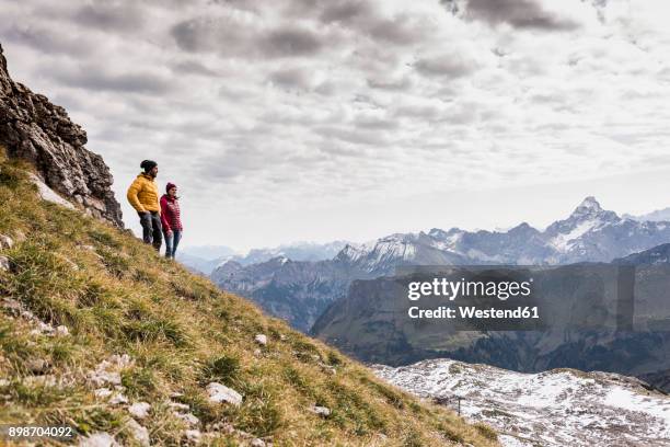 germany, bavaria, oberstdorf, two hikers in alpine scenery - tourism life in bavaria foto e immagini stock