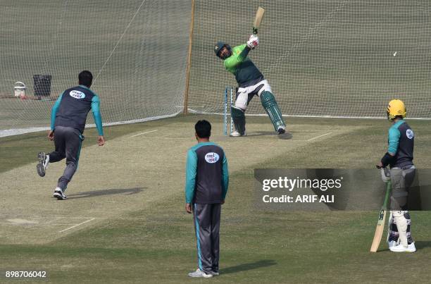 Pakistani cricketers take part in a practice session in Lahore on December 26, 2017. Pakistan still have bowlers who can put pressure on New Zealand...