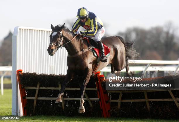 If The Cap Fits ridden by Noel Fehily clear the last flight before going on to win The 32Red Casino Novices' Hurdle Race run during the 32Red Winter...