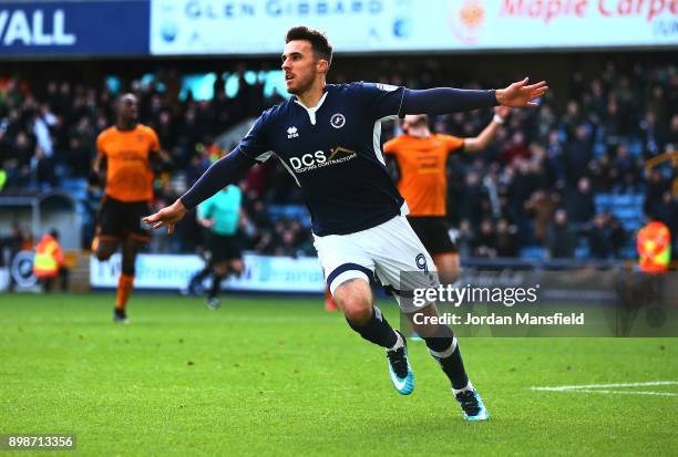 Lee Gregory of Millwall celebrates scoring his sides first goal during the Sky Bet Championship match between Millwall and Wolverhampton at The Den...