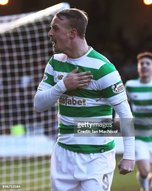 Leigh Griffiths of Celtic celebrates after he scores his team's second goal during the Scottish Premier League match between Dundee and Celtic at...