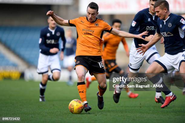 Diogo Jota of Wolverhampton Wanderers and Shaun Hutchinson of Millwall during the Sky Bet Championship match between Millwall and Wolverhampton at...